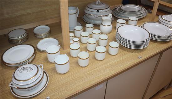 A Hammersley part dinner service with a gilt key pattern border